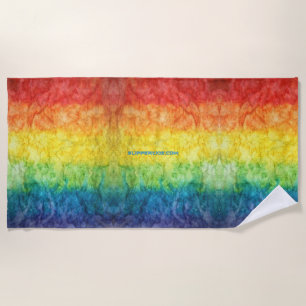 SlipperyJoe's tie-dyed flag rainbow pressed into s Beach Towel
