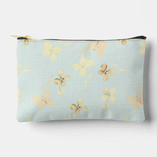 Small accessory bag with floral design.