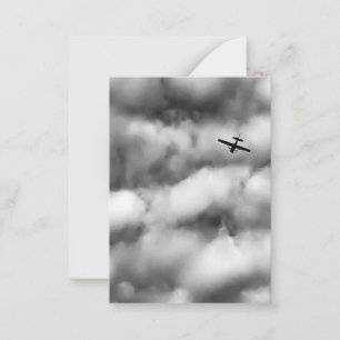 Small Airplane Flying in Cloudy Sky Photo Card