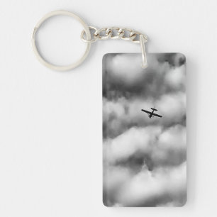 Small Airplane Flying in Cloudy Sky Photo Key Ring