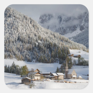 Small alpine village in the snow square sticker