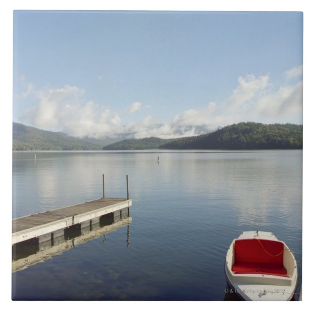 Small boat tied up on dock at Lake Placid Tile (Front)