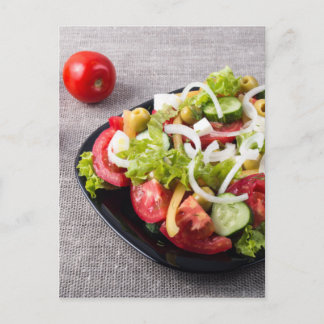 Small bowl of salad made from natural vegetables postcard