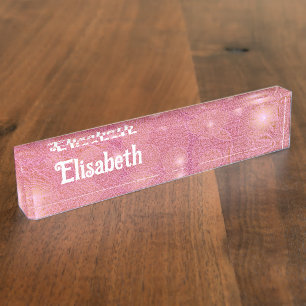 small bright stars on pink nameplate