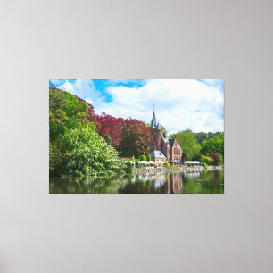 Small castle near lake in Bruges, Belgium Canvas Print