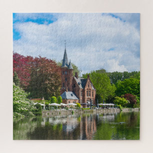 Small castle near lake in Bruges, Belgium Jigsaw Puzzle