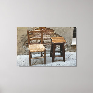 Small chair and stool, Pienza, Italy Canvas Print
