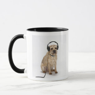 Small dog wearing headphones mug