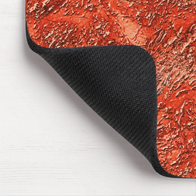 Small furrow texture on cardinal red to copper thr mouse mat (Corner)