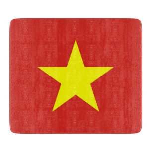 Small glass cutting board with flag of Vietnam