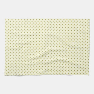 Small green dots on off white tea towel