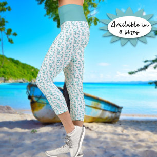 Small Linked Teal Hearts Pattern Over White Capri Leggings