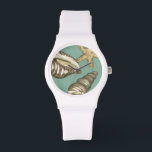 Small Shell Trio on Teal Watch<br><div class="desc">Megan Meagher is known for her simple art pieces. This image captures the simplicity of the seashore's treasures,  of a conch shells and a starfish. Meagher encompasses a teal background in her image to contrast these treasures. Get this fine art print today on your Zazzle product today.</div>