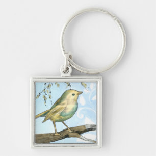 Small Yellow Bird Perched on a Branch Looking up Key Ring