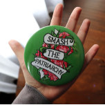 Smash the Patriarchy 6 Cm Round Badge<br><div class="desc">Smash the Patriarchy Bold and beautiful, this design pairs the powerful phrase "Smash the Patriarchy" with a tangle of defiant blooming roses. A striking visual statement for feminists who believe strength and softness can coexist. Ideal for protests, Pride season, International Women's Day, or everyday resistance. Great for activists, intersectional feminists,...</div>