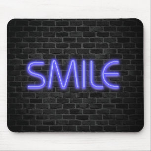 SMILE text in neon lights on brick Mouse Mat