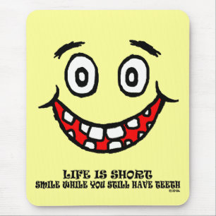 Smile while you still have teeth mouse mat