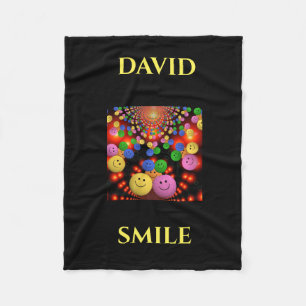 Smiley face personalised name fleece blanket.