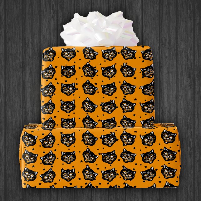 Smiling Halloween black Cat Face Orange Stars Wrapping Paper (Halloween black cat smiling faces on little black stars on bright orange wrapping paper roll.)