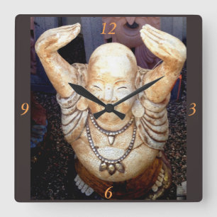 smiling happy buddha clock