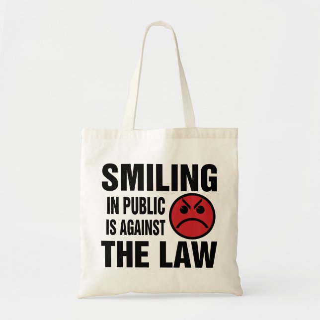 Smiling in Public is Against the Law Tote Bag (Front)