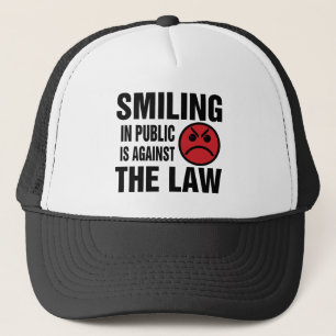 Smiling in Public is Against the Law Trucker Hat
