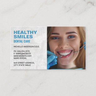 Smiling Woman Getting Teeth Cleaned Business Card