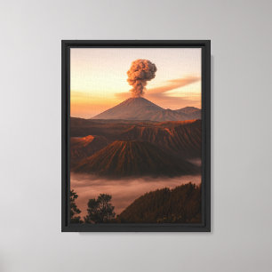 Smoking Volcano at Sunrise over Foggy Valley Canvas Print
