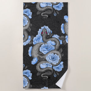 Snakes and blue roses beach towel
