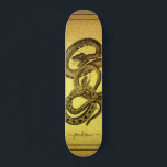 Snakes Personalized Faux Gold Foil Skateboard<br><div class="desc">A unique skateboard featuring two snakes entangled and your name personalized in a script signature on a faux gold foil background. eye catching and bold.</div>