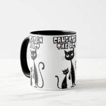 Sneaky Smiles: Black Kitten with a Smiling Compani