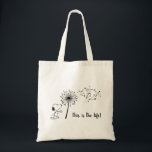 Snoopy With Dandelion Tote Bag<br><div class="desc">Check out this graphic of Snoopy blowing on a giant dandelion.</div>