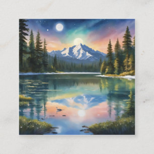Snow-capped mountains and a clear lake. square business card