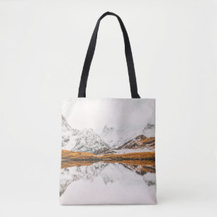 SNOW-CAPPED ROCKY MOUNTAIN UNDER CLOUDY SKY DURING TOTE BAG