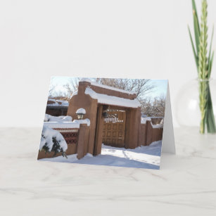 Snow covered adobe gates holiday card