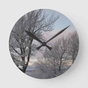 Snow Covered Branches Round Clock