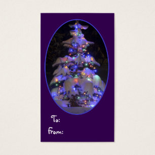 Snow Covered Brightly Lit Christmas Tree