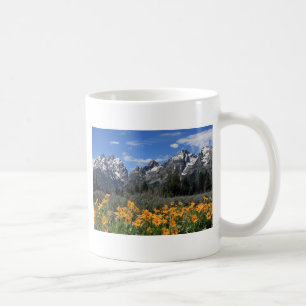 Snow Covered Grand Teton Range with Yellow Flowers Coffee Mug