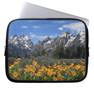 Snow Covered Grand Teton Range with Yellow Flowers Laptop Sleeve