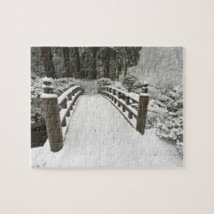 Snow-covered moon bridge, Japanese Garden Jigsaw Puzzle