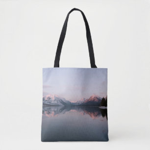 SNOW COVERED MOUNTAIN NEAR LAKE DURING DAYTIME TOTE BAG