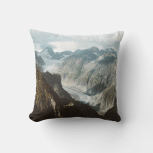 SNOW COVERED MOUNTAINS DURING DAYTIME CUSHION