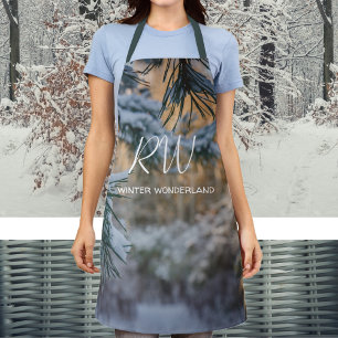 Snow-covered pine branches apron