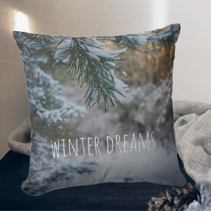 Snow-covered pine branches cushion