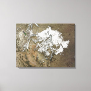 Snow covers the Rocky Mountains in United State Canvas Print