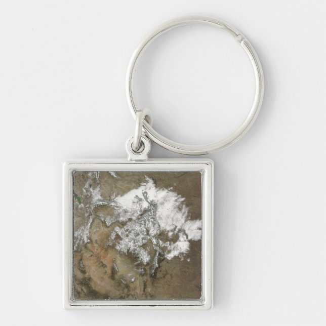 Snow covers the Rocky Mountains in United State Key Ring (Front)