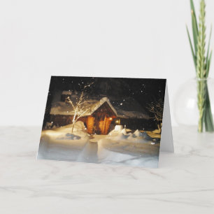 Snow Falling on Log House at Night Christmas Card