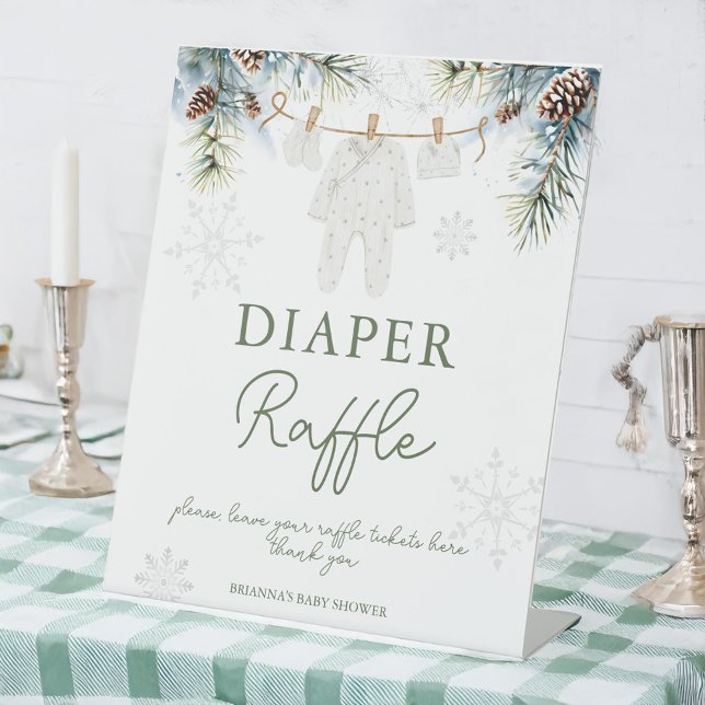Snow in love winter baby shower diaper raffle pedestal sign (Snow in love baby clothes on a line winter baby shower diaper raffle table pedestal sign)