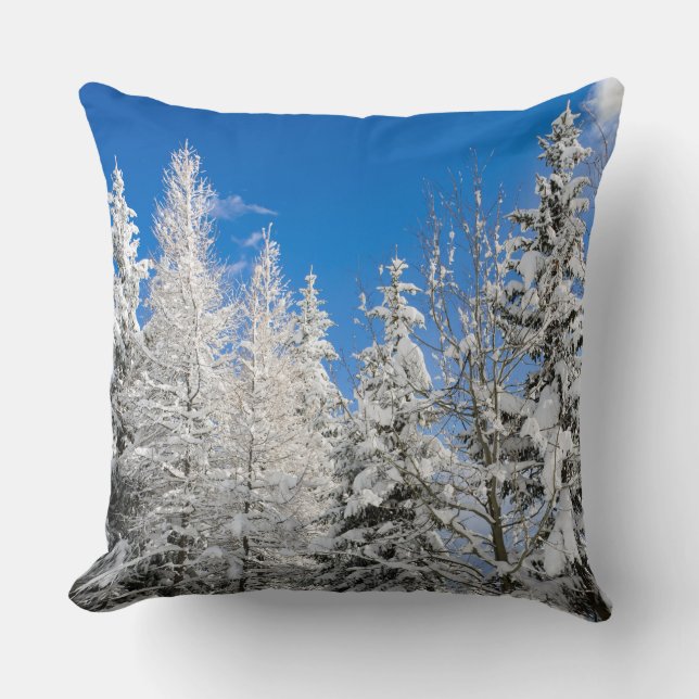 Snow trees under a clear blue sky cushion (Front)