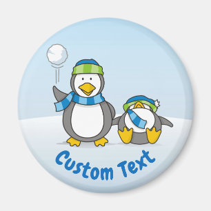 Snowballing penguins magnet